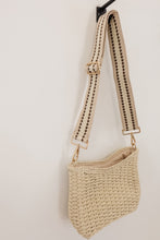 Load image into Gallery viewer, weekend getaway bag in the color cream. bag is shown with the canvas crossbody strap attached.