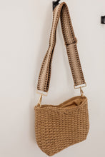 Load image into Gallery viewer, weekend getaway bag in the color tan. bag is shown with the canvas crossbody strap attached.