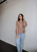 Load image into Gallery viewer, model wearing the my way back home sweater in the color taupe. model has the sweater paired with a pair of light wash denim.