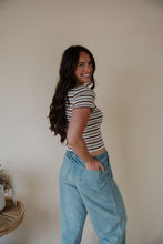 Load image into Gallery viewer, back view of model wearing the lovely day tee.