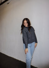 Load image into Gallery viewer, model wearing the my way back home sweater in the color charcoal. model has the sweater paired with a pair of light wash denim.