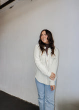 Load image into Gallery viewer, model wearing the right where you left me shacket in the color cream. model has the shacket paired with the can&#39;t get enough top in the color brown and a pair of light wash denim.