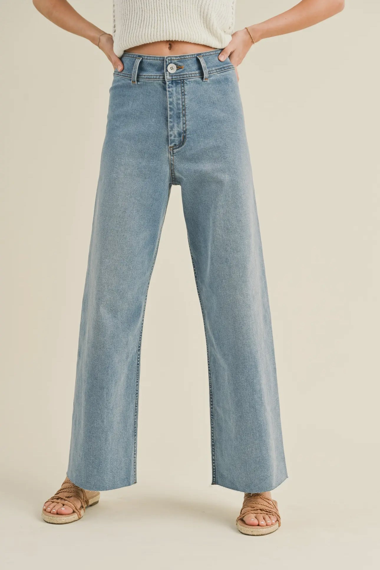 front view of model wearing the Addison denim in the color denim.