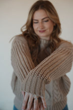 Load image into Gallery viewer, detail view of model wearing the finally yours sweater. model has the sweater paired with the lawson denim.