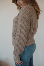 Load image into Gallery viewer, detail view of model wearing the finally yours sweater. model has the sweater paired with the lawson denim.