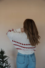 Load image into Gallery viewer, back view of model wearing the winter wonderland sweater. model has the sweater paired with the genevive denim.