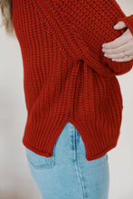 Load image into Gallery viewer, detail view of model wearing the patiently waiting sweater. model has the sweater paired with the genevive denim.