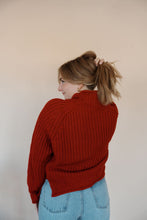 Load image into Gallery viewer, back view of model wearing the patiently waiting sweater. model has the sweater paired with the genevive denim.