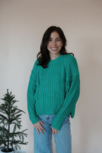 Load image into Gallery viewer, front view of model wearing the my way back home sweater in the color kelly green.