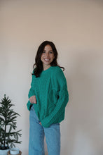 Load image into Gallery viewer, front view of model wearing the my way back home sweater in the color kelly green.