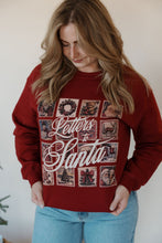 Load image into Gallery viewer, front view of model wearing the letters to santa crewneck sweatshirt. model has the sweatshirt paired with the genevive denim.