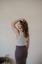 Load image into Gallery viewer, back view of model wearing the long live skirt in the color mocha. model has the skirt paired with the forever yours top in the color light beige.