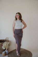Load image into Gallery viewer, front view of model wearing the long live skirt in the color mocha. model has the skirt paired with the forever yours top in the color light beige.