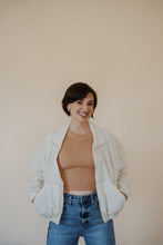 Load image into Gallery viewer, front view of model wearing the cherish the moment jacket in the color white dove. model has the jacket paired with the forever yours top in the color macchiato and the aurora denim.