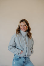 Load image into Gallery viewer, front view of model wearing the cherish the moment jacket in the color misty grey. model has the jacket paired with the never hesitate top in the color black and the charleston denim.