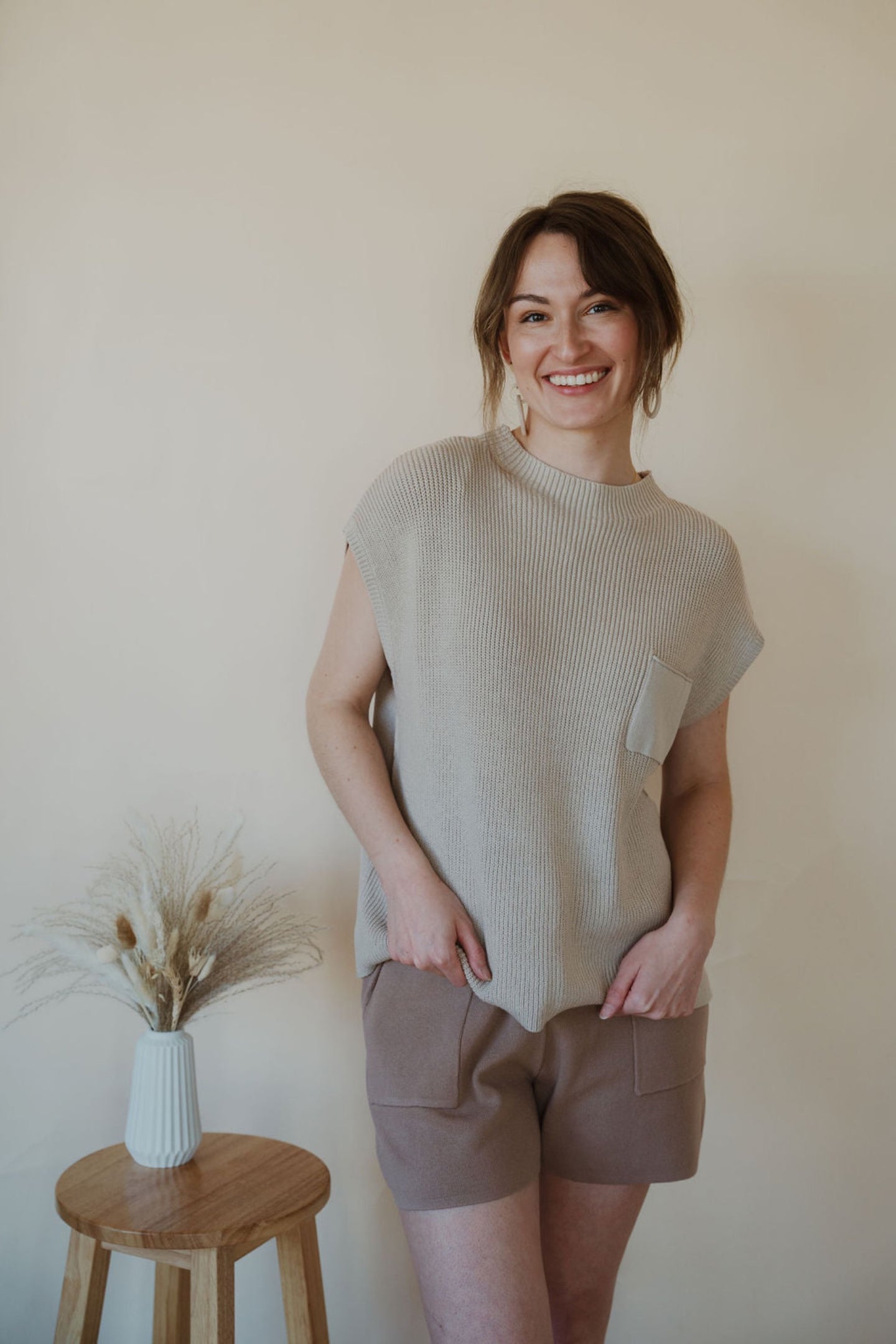 front view of model wearing the used to be set in the color taupe/mocha.