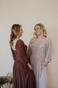 models wearing the all my love maxi dress in the colors chocolate and taupe.