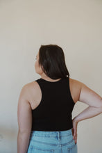 Load image into Gallery viewer, back view of model wearing the change your mind bodysuit in the color black. model has the bodysuit paired with the charleston denim.