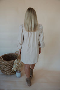 back view of model wearing the is it love dress.