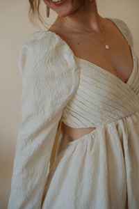 detail view of model wearing the hooked on you dress.