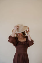 Load image into Gallery viewer, close front view of model wearing the all my love maxi dress in the color chocolate.