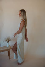 Load image into Gallery viewer, side view of model wearing the closer to love dress.