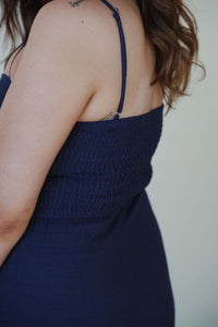 detail view of model wearing the anywhere with you dress.