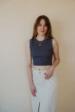 Load image into Gallery viewer, front view of model wearing the forever yours top in the color navy. model has the top paired with the all over again denim midi skirt.