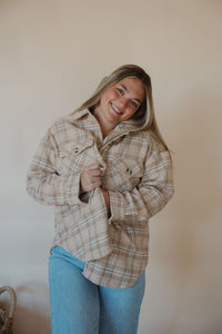 front view of model wearing the make things right shacket. model has the shacket paired with the forever yours tank in the color white and the genevive denim.