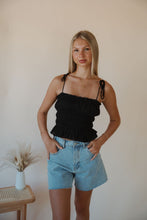 Load image into Gallery viewer, front view of model wearing the so surreal top. model has the top paired with the dakota denim shorts.