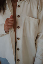 Load image into Gallery viewer, detail view of model wearing the all this time shacket. model has the shacket paired with the forever yours top in the color macchiato and the charleston denim.