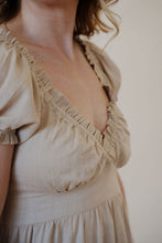 Load image into Gallery viewer, close detail view of model wearing the whispering willow dress.