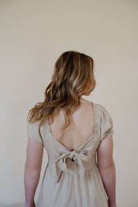 close back view of model wearing the whispering willow dress.