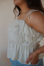 Load image into Gallery viewer, detail side view of model wearing the by the shore top. model has the top paired with the boston denim shorts.