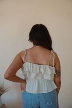 Load image into Gallery viewer, back view of model wearing the by the shore top. model has the top paired with the boston denim shorts.