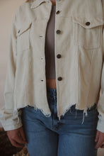 Load image into Gallery viewer, detail view of model wearing the only just begun jacket in the color beige. model has the jacket paired with the forever yours top in the color burnt taupe and the aurora denim.