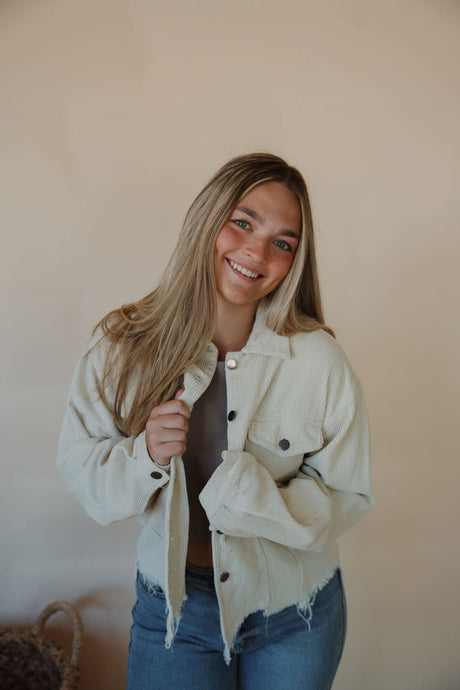 front view of model wearing the only just begun jacket in the color beige. model has the jacket paired with the forever yours tank in the color burnt taupe and the aurora denim.