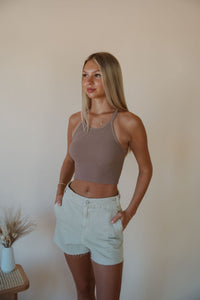 front view of model wearing the these days top in the color espresso. model has the top paired with the parker denim shorts.