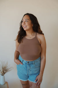 front view of model wearing the these days top in the color vintage mocha. model has the top paired with the boston denim shorts.
