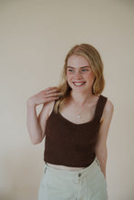 Load image into Gallery viewer, front view of model wearing the too good to be true tank. model has the tank paired with the parker shorts.