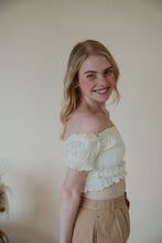 Load image into Gallery viewer, side view of model wearing the steady love top. model has the top paired with the sweetest melody shorts in the color khaki.