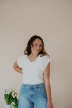 Load image into Gallery viewer, front view of model wearing the look after you sweater vest. model has the sweater vest paired with the austin denim shorts.