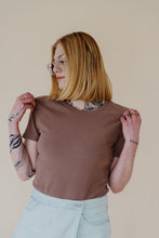 Load image into Gallery viewer, front view of model wearing the take a chance bodysuit in the color mocha.