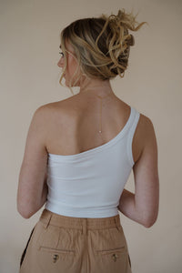 back view of model wearing the last to know top in the color white.