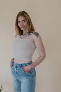 front view of model wearing the last to know top in the color chalk.