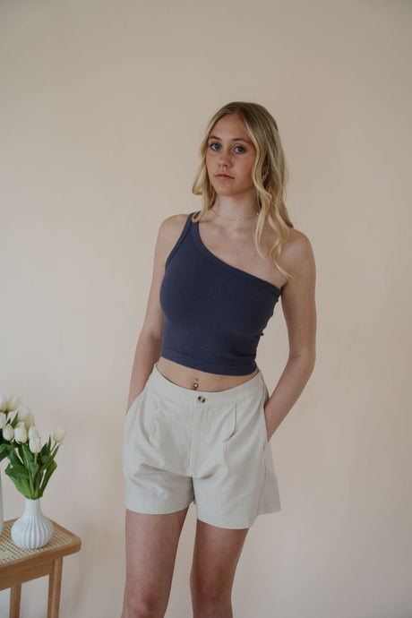 front view of model wearing the making promises shorts. model has the shorts paired with the last to know top in the color asphalt grey.