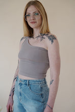 Load image into Gallery viewer, side view of model wearing the last to know top in the color smoky taupe.