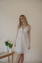 Load image into Gallery viewer, front view of model wearing the means so much dress.