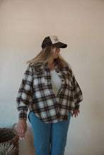 Load image into Gallery viewer, front view of model wearing the yeehaw trucker hat. model has the hat paired with the something&#39;s changed shacket and the forever yours tank in the color light beige.