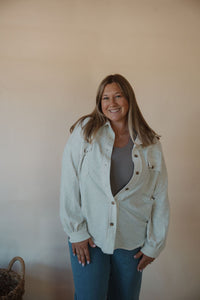 front view of model wearing the never be the same shacket. model has the shacket paired with the change your mind bodysuit in the color smoky taupe.